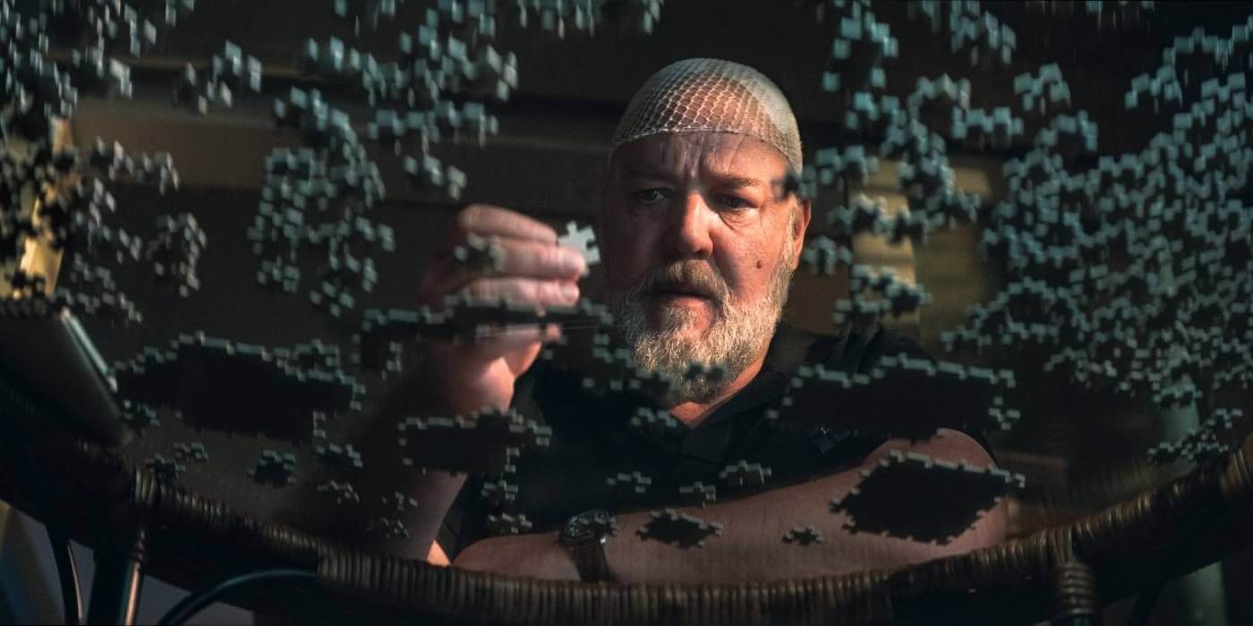 Personagem de Russell Crowe tenta colher os cacos da memória em A Teia (Crédito: Imagem Filmes)