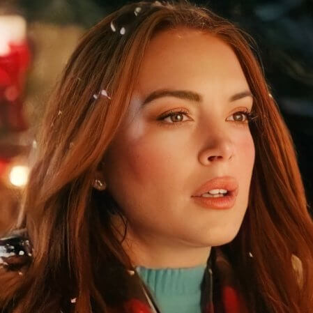 Lindsay Lohan regresa a las comedias románticas en el tráiler de ‘Navidad de golpe’
