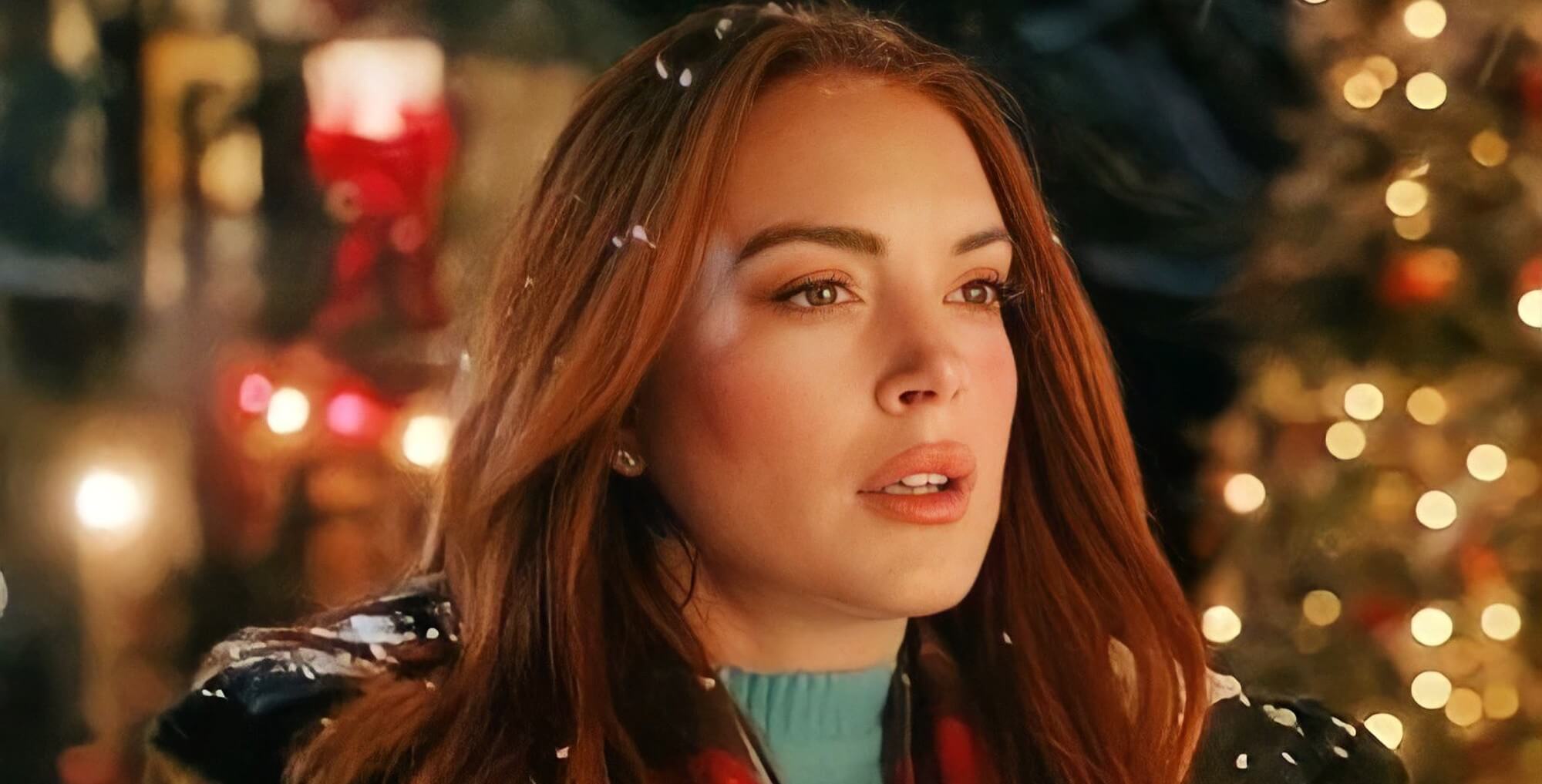 Lindsay Lohan regresa a las comedias románticas en el tráiler de ‘Navidad de golpe’