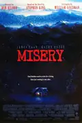 Misery: A famous author is rescued from a crash but discovers his devoted fan’s care turns into a terrifying nightmare of captivity. Filmelier Image